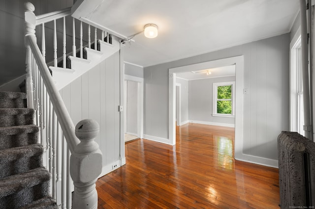 49 Freeman Ave, Norwich, CT 06360 - stairway featuring wood-type flooring and ornamental molding