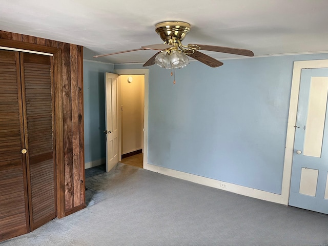 57 New Britain Ave, Farmington, CT 06085 - unfurnished bedroom featuring carpet flooring, a closet, crown molding, and ceiling fan