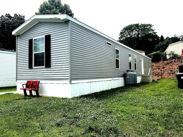 435 High St Lot 10, Groton, CT 06355 - view of side of home with a lawn
