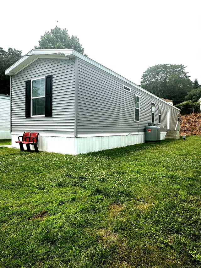 435 High St Lot 10, Groton, CT 06355 - view of home's exterior featuring a yard