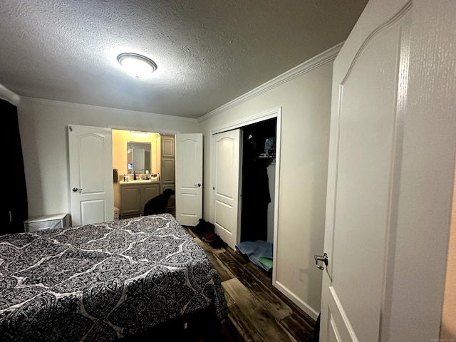 435 High St Lot 10, Groton, CT 06355 - bedroom featuring dark wood-type flooring, ornamental molding, a textured ceiling, and a closet