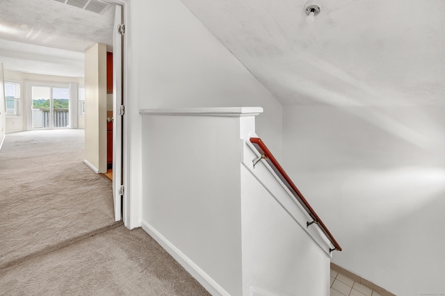 173 Russo Ave Unit 409, East Haven, CT 06513 - stairs featuring carpet floors, lofted ceiling, and a water view