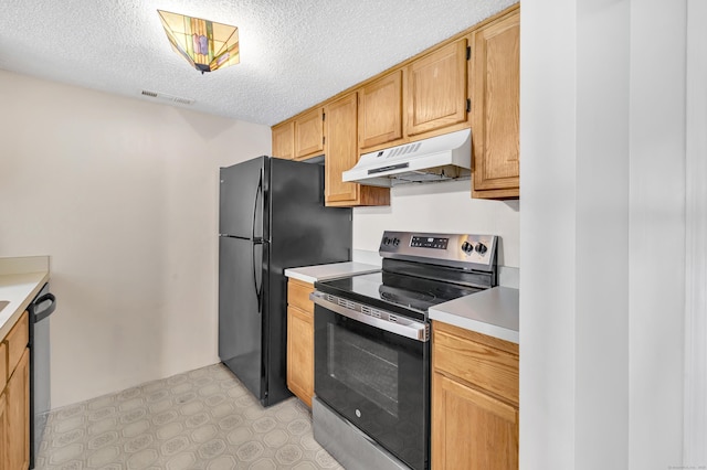 173 Russo Ave Unit 409, East Haven, CT 06513 - kitchen featuring electric stove, under cabinet range hood, a textured ceiling, light countertops, and freestanding refrigerator