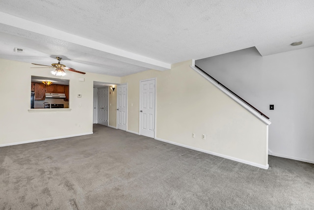 173 Russo Ave Unit 409, East Haven, CT 06513 - unfurnished living room with a textured ceiling, carpet floors, and a ceiling fan