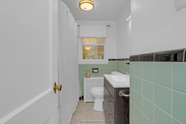 40 Rosina Rd, Hamden, CT 06514 - bathroom with vanity, tile patterned flooring, wainscoting, and tile walls