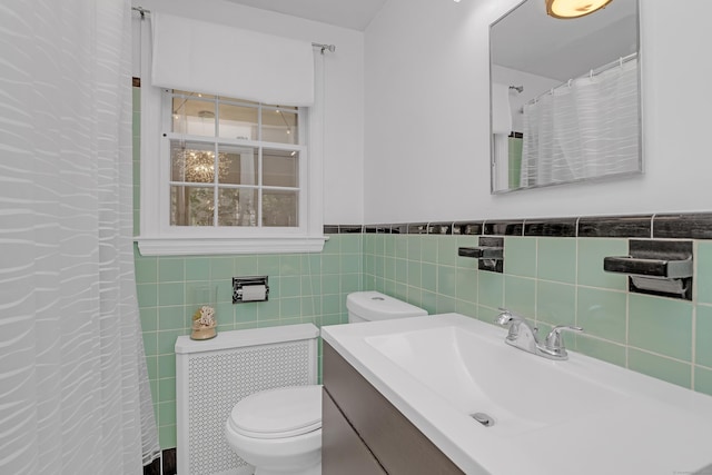 40 Rosina Rd, Hamden, CT 06514 - bathroom with vanity, tile walls, a wainscoted wall, and a shower with curtain