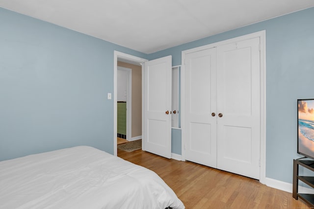 40 Rosina Rd, Hamden, CT 06514 - bedroom with wood finished floors and a closet