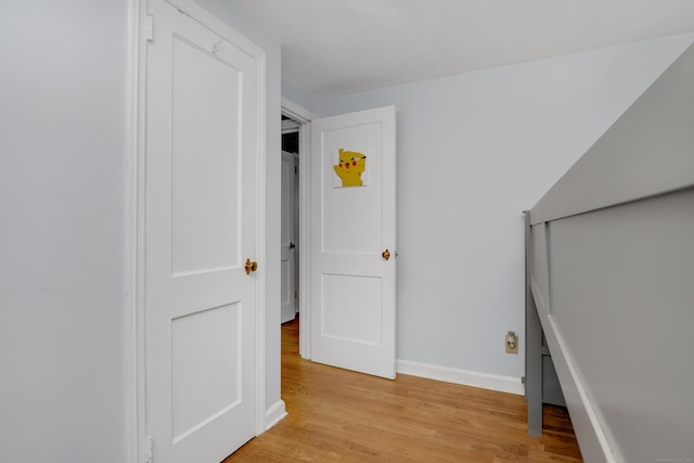 40 Rosina Rd, Hamden, CT 06514 - hall with light wood-style flooring and baseboards