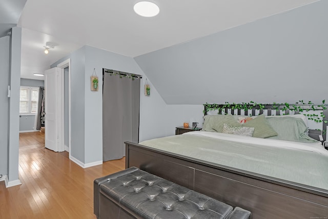 40 Rosina Rd, Hamden, CT 06514 - bedroom with light wood-type flooring and lofted ceiling