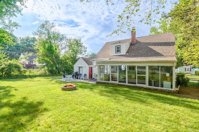 40 Rosina Rd, Hamden, CT 06514 - rear view of house featuring a fire pit, a yard, a sunroom, and a chimney