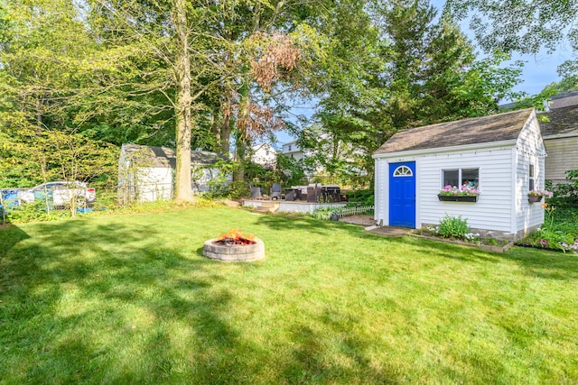 40 Rosina Rd, Hamden, CT 06514 - view of yard with a fire pit and a storage shed