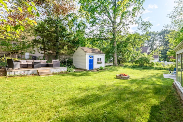 40 Rosina Rd, Hamden, CT 06514 - fenced backyard with an outdoor living space with a fire pit and a shed