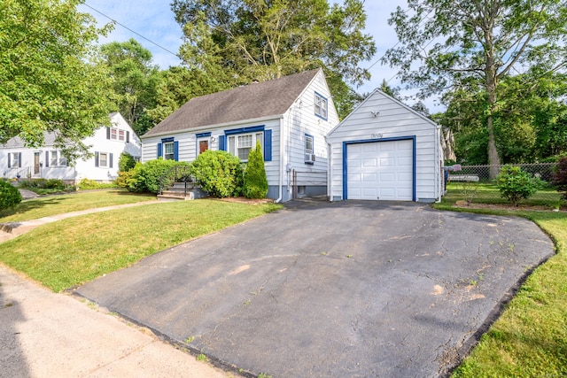40 Rosina Rd, Hamden, CT 06514 - view of front of home with a detached garage, an outbuilding, and asphalt driveway