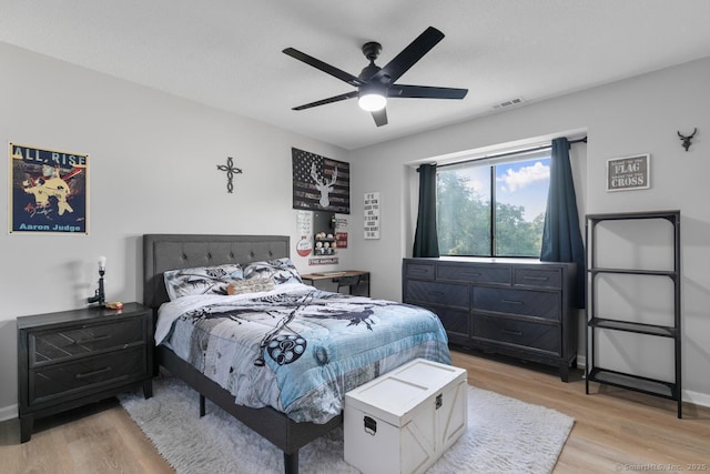 121 Russo Ave Unit 11, East Haven, CT 06513 - bedroom featuring light wood finished floors and a ceiling fan