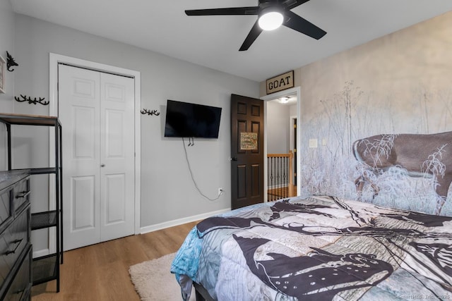 121 Russo Ave Unit 11, East Haven, CT 06513 - bedroom with wood finished floors, a closet, and ceiling fan