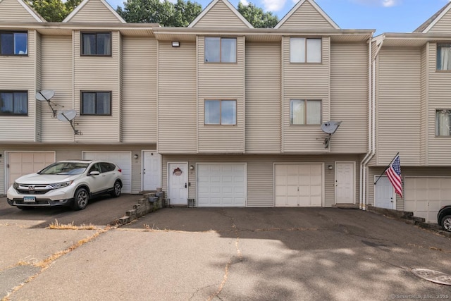 121 Russo Ave Unit 11, East Haven, CT 06513 - townhome / multi-family property with a garage and driveway