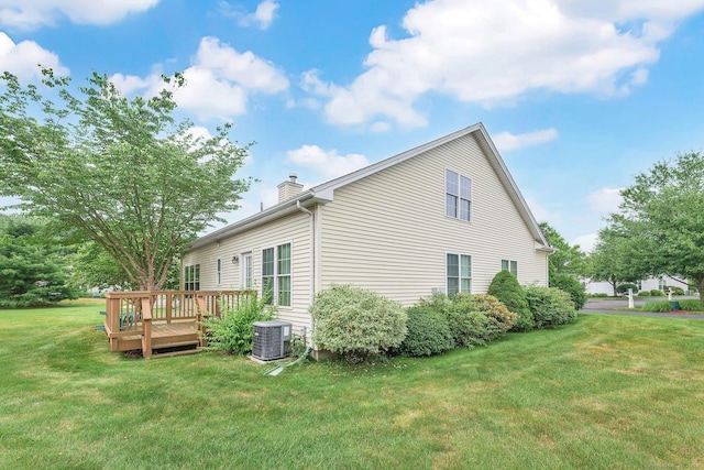 6 Mountainview Cir Unit 6, Ellington, CT 06029 - view of property exterior with a chimney, a wooden deck, and a yard