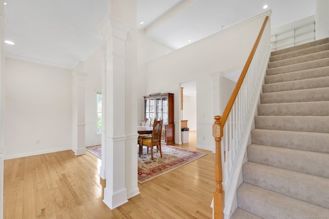 6 Mountainview Cir Unit 6, Ellington, CT 06029 - foyer with light wood finished floors, decorative columns, stairway, a towering ceiling, and recessed lighting
