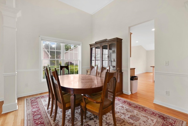 6 Mountainview Cir Unit 6, Ellington, CT 06029 - dining space featuring vaulted ceiling, light wood-style floors, and decorative columns