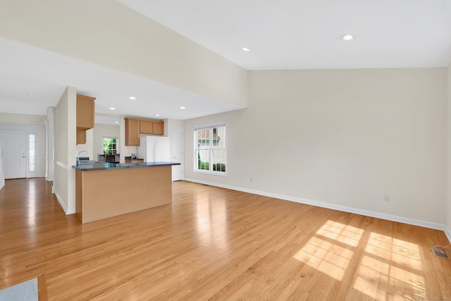 6 Mountainview Cir Unit 6, Ellington, CT 06029 - unfurnished living room featuring light wood-style flooring and recessed lighting