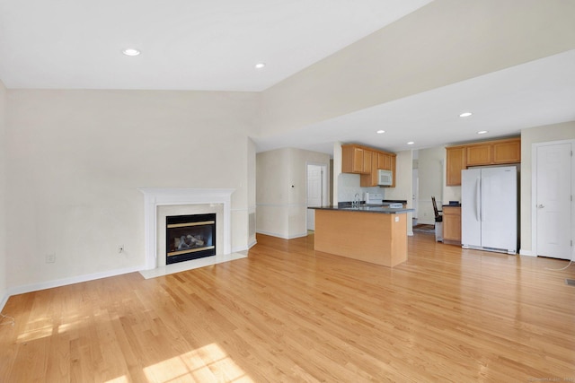 6 Mountainview Cir Unit 6, Ellington, CT 06029 - unfurnished living room featuring light wood finished floors, recessed lighting, and a high end fireplace