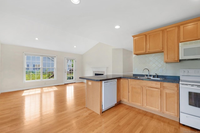 6 Mountainview Cir Unit 6, Ellington, CT 06029 - kitchen featuring white appliances, open floor plan, a peninsula, backsplash, and light wood finished floors