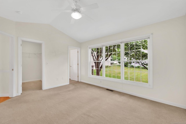 6 Mountainview Cir Unit 6, Ellington, CT 06029 - unfurnished bedroom with carpet, lofted ceiling, a walk in closet, ceiling fan, and a closet
