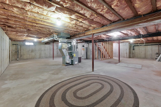 6 Mountainview Cir Unit 6, Ellington, CT 06029 - unfinished basement with water heater, heating unit, and stairs