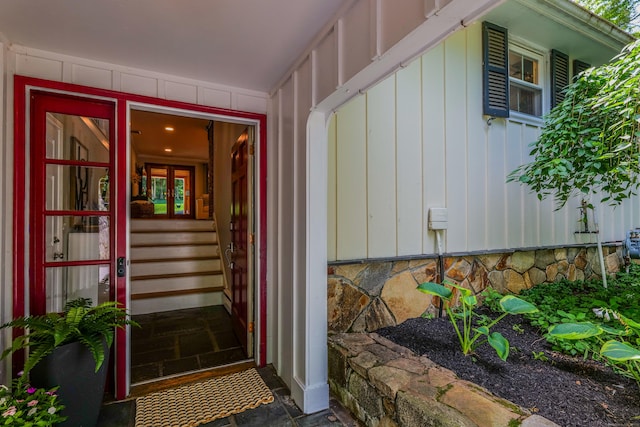 24 Buttonball Ln, Glastonbury, CT 06033 - doorway to property with board and batten siding