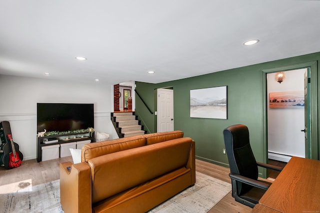 24 Buttonball Ln, Glastonbury, CT 06033 - living room with wood finished floors, a baseboard heating unit, stairway, and recessed lighting