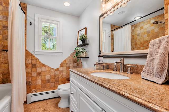 24 Buttonball Ln, Glastonbury, CT 06033 - full bathroom featuring baseboard heating, tile walls, vanity, tile patterned flooring, and shower / bath combination with curtain