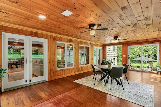 24 Buttonball Ln, Glastonbury, CT 06033 - dining space featuring wood walls, wooden ceiling, hardwood / wood-style flooring, and ceiling fan