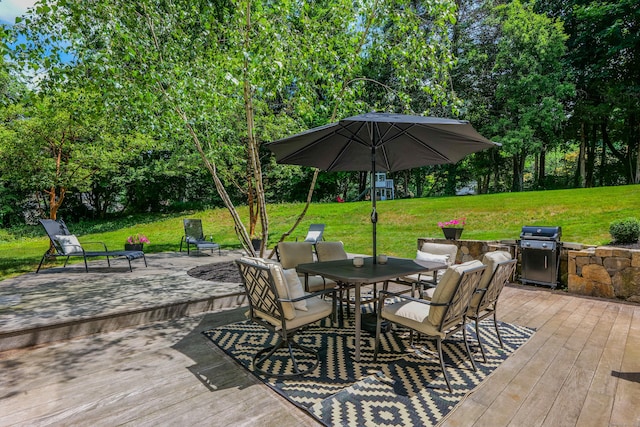 24 Buttonball Ln, Glastonbury, CT 06033 - wooden deck with outdoor dining area, a lawn, a grill, and view of wooded area