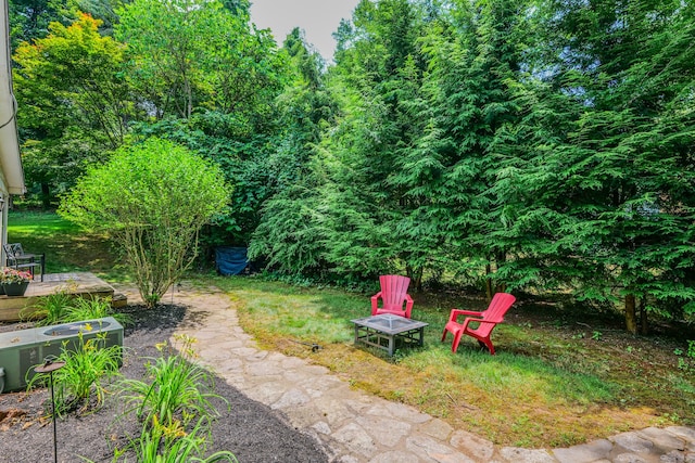 24 Buttonball Ln, Glastonbury, CT 06033 - view of yard featuring an outdoor fire pit