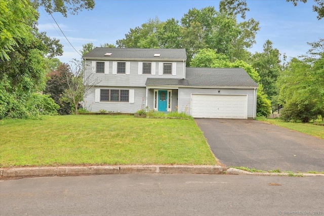 53 Montclair Dr, Manchester, CT 06042 - view of front of property featuring a garage, asphalt driveway, and a front lawn