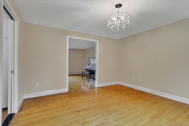 53 Montclair Dr, Manchester, CT 06042 - spare room featuring light wood-type flooring and a chandelier