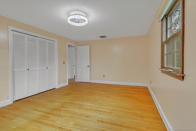 53 Montclair Dr, Manchester, CT 06042 - unfurnished bedroom with light wood-type flooring and a closet
