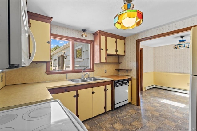 45 Canton Rd, Granby, CT 06035 - kitchen featuring dishwasher, wallpapered walls, a baseboard heating unit, light countertops, and stone finish flooring