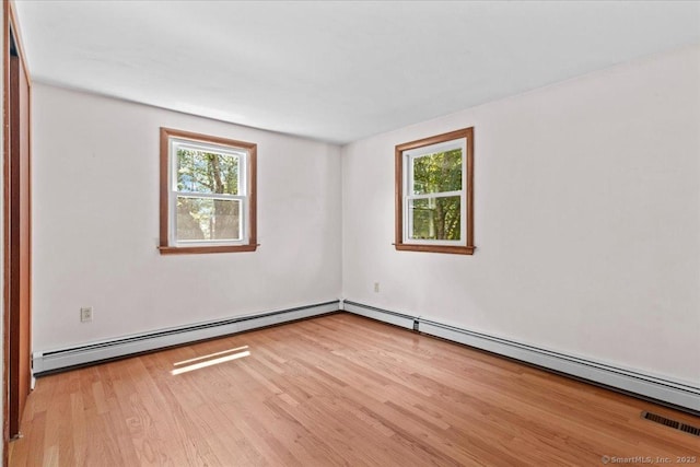 45 Canton Rd, Granby, CT 06035 - spare room with wood finished floors and a baseboard radiator