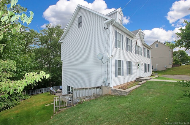 29 Quarry Ln, Hamden, CT 06518 - view of side of home with a yard