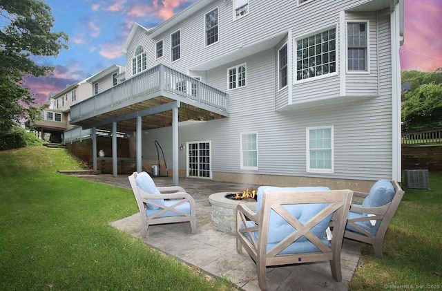 29 Quarry Ln, Hamden, CT 06518 - rear view of property featuring an outdoor fire pit, a yard, a patio, and a wooden deck