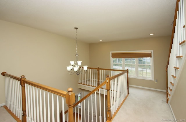29 Quarry Ln, Hamden, CT 06518 - hall with a chandelier, an upstairs landing, light colored carpet, and recessed lighting