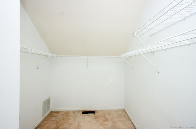 29 Quarry Ln, Hamden, CT 06518 - spacious closet featuring light carpet and lofted ceiling
