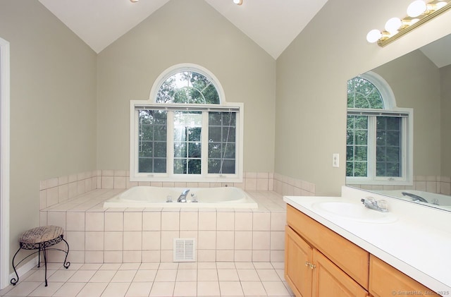29 Quarry Ln, Hamden, CT 06518 - full bathroom featuring lofted ceiling, a bath, vanity, and plenty of natural light