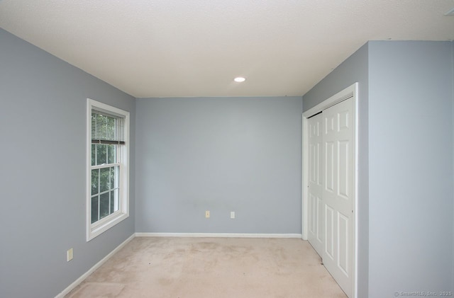 29 Quarry Ln, Hamden, CT 06518 - unfurnished bedroom featuring light colored carpet, a closet, and recessed lighting
