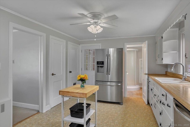 80 Bread And Milk St, Coventry, CT 06238 - kitchen with stainless steel appliances, white cabinetry, a ceiling fan, light countertops, and light flooring