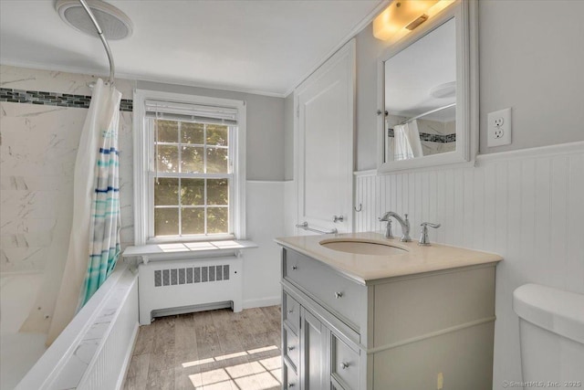 80 Bread And Milk St, Coventry, CT 06238 - bathroom with radiator, wainscoting, vanity, shower / bath combination with curtain, and wood finished floors