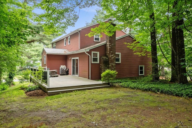18 Banks Rd, Simsbury, CT 06070 - back of house featuring a wooden deck and a lawn