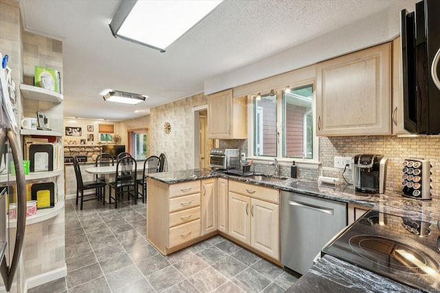 18 Banks Rd, Simsbury, CT 06070 - kitchen with light brown cabinetry, dishwasher, a peninsula, backsplash, and dark stone counters