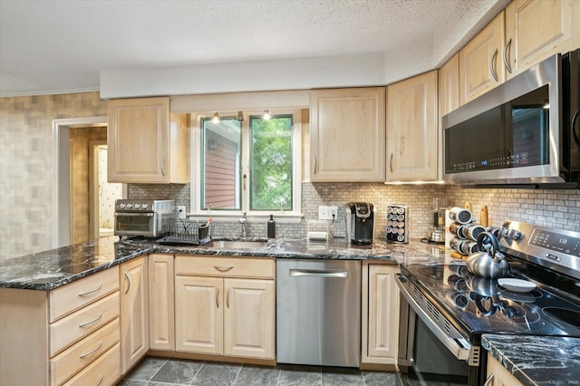 18 Banks Rd, Simsbury, CT 06070 - kitchen featuring stainless steel appliances, light brown cabinetry, decorative backsplash, and a peninsula